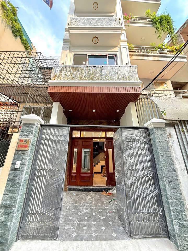 Nhà VIP Nguyễn An Ninh, 6 tầng thang máy, ô tô đỗ cửa, 2 thoáng mát