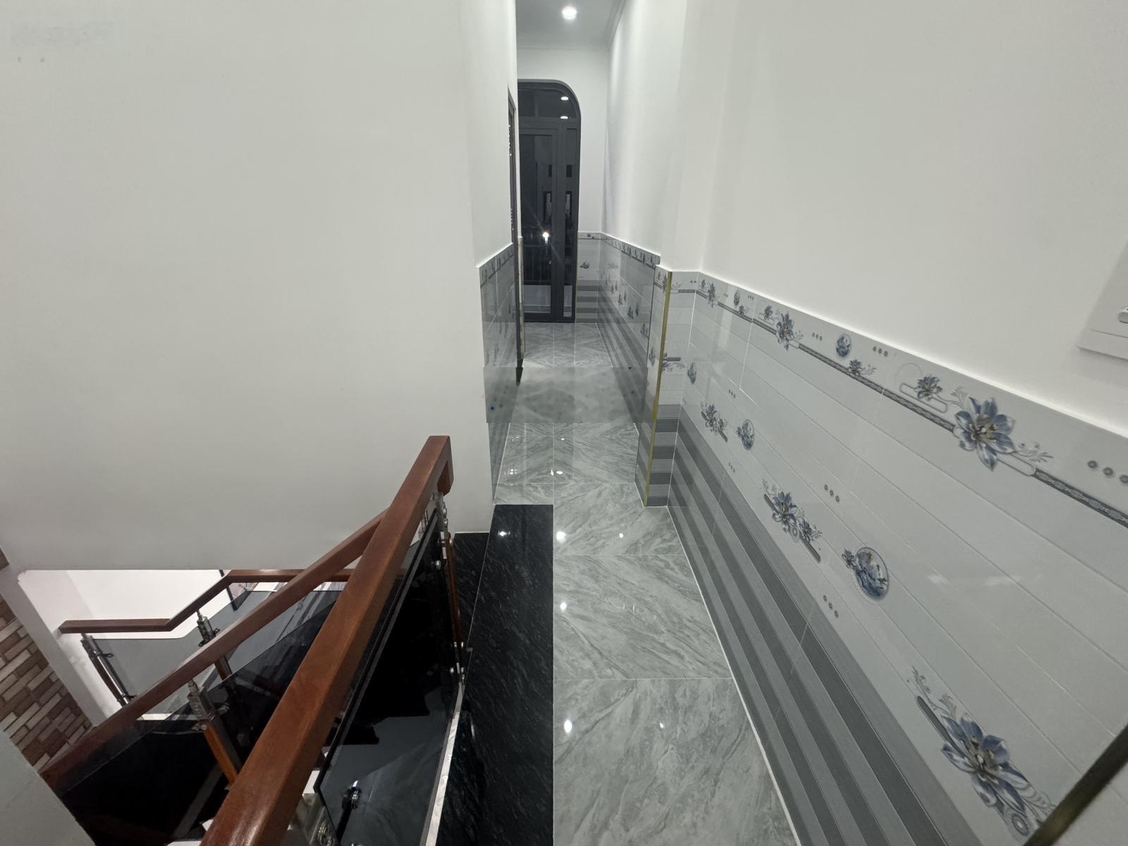 Nhà 2 tầng xinh lung linh- hóc môn giáp q12- oto đậu cửa- 4x17m chỉ 4.7ty