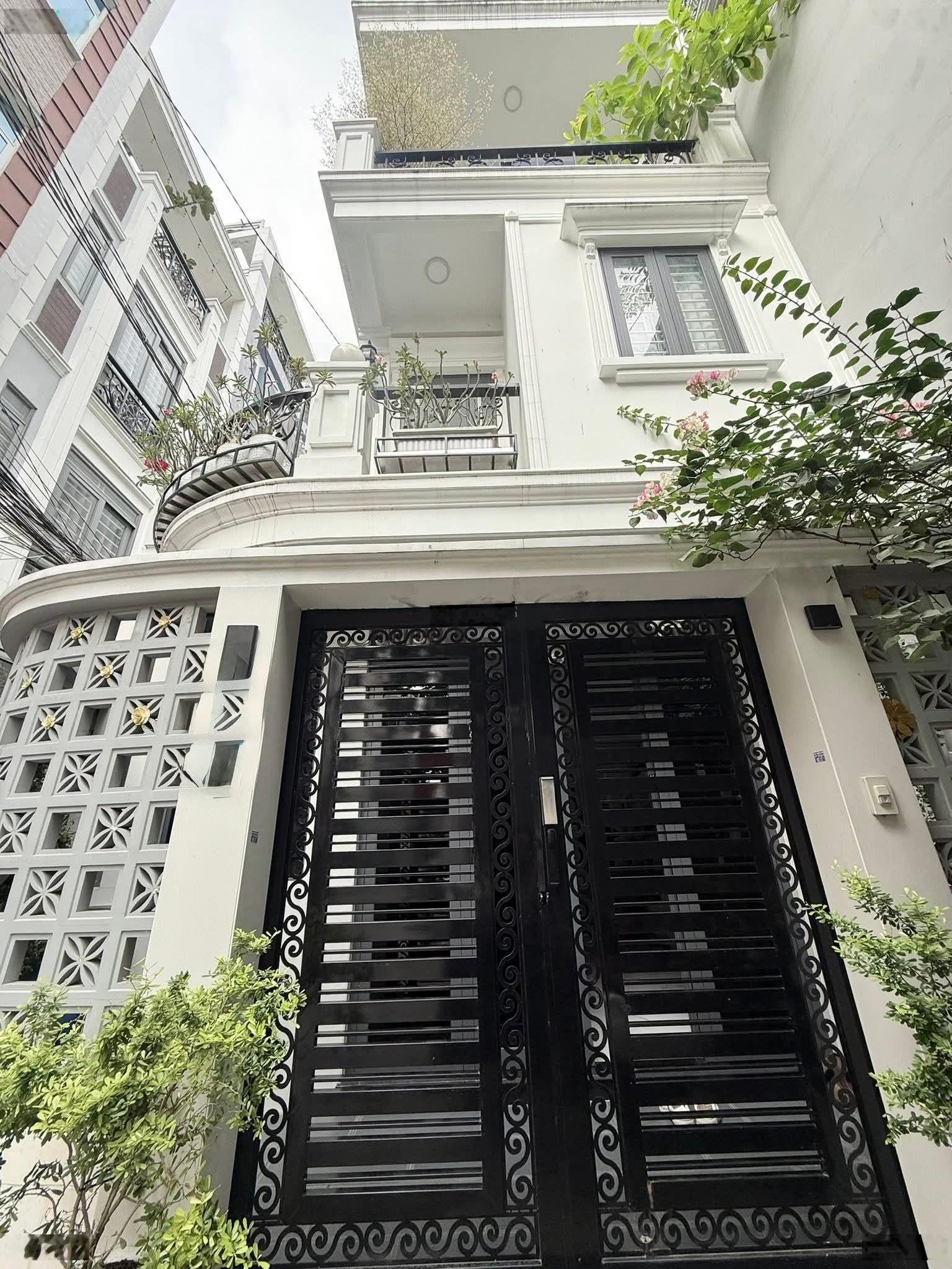 Kiến trúc sư thiết kế. ngang 5,2m. cách mt huỳnh văn bánh 25m .tổng 52m