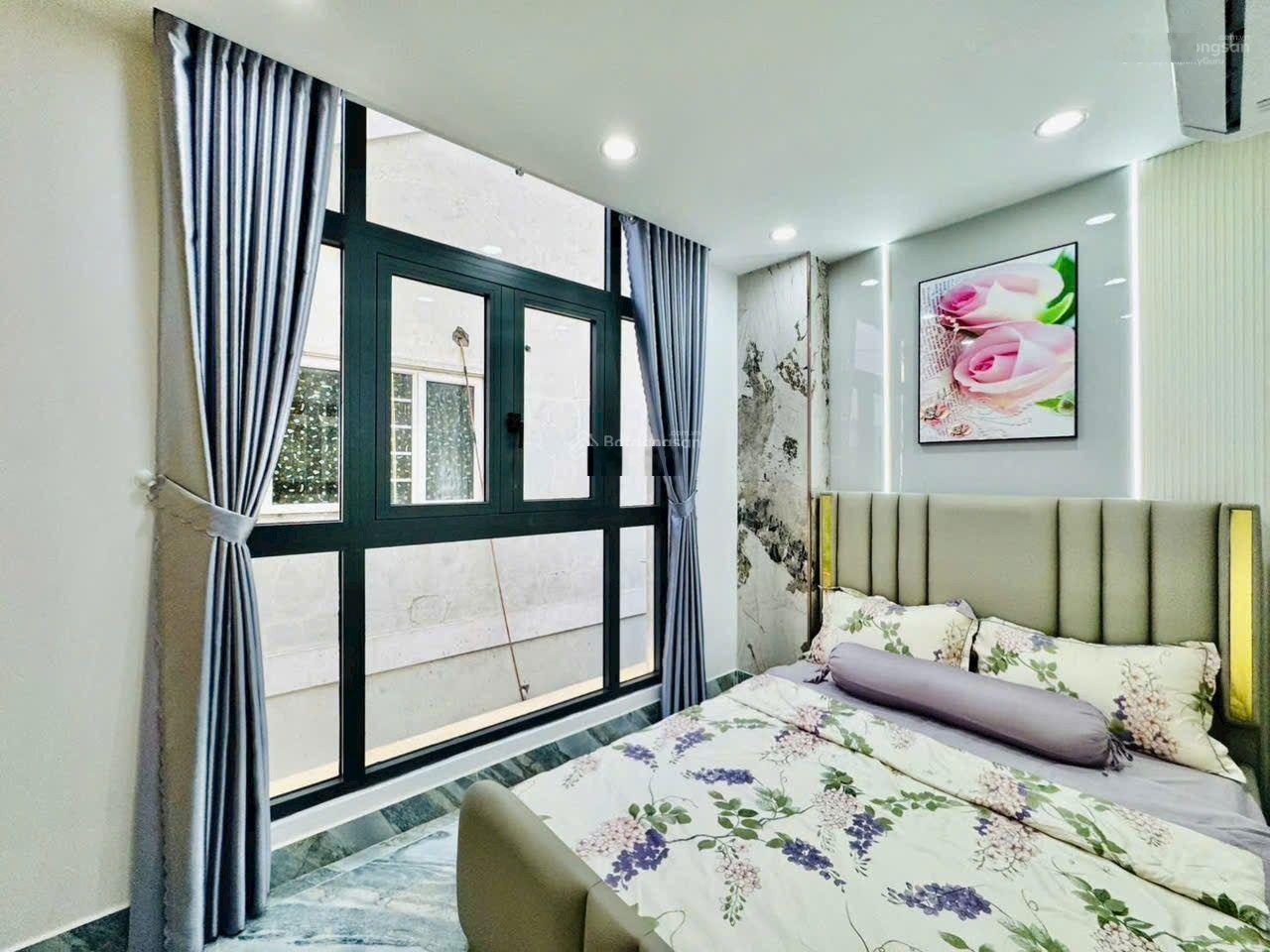 Nhà đẹp xây mới, xe hơi cửa, ngay quang trung p14 gò vấp.