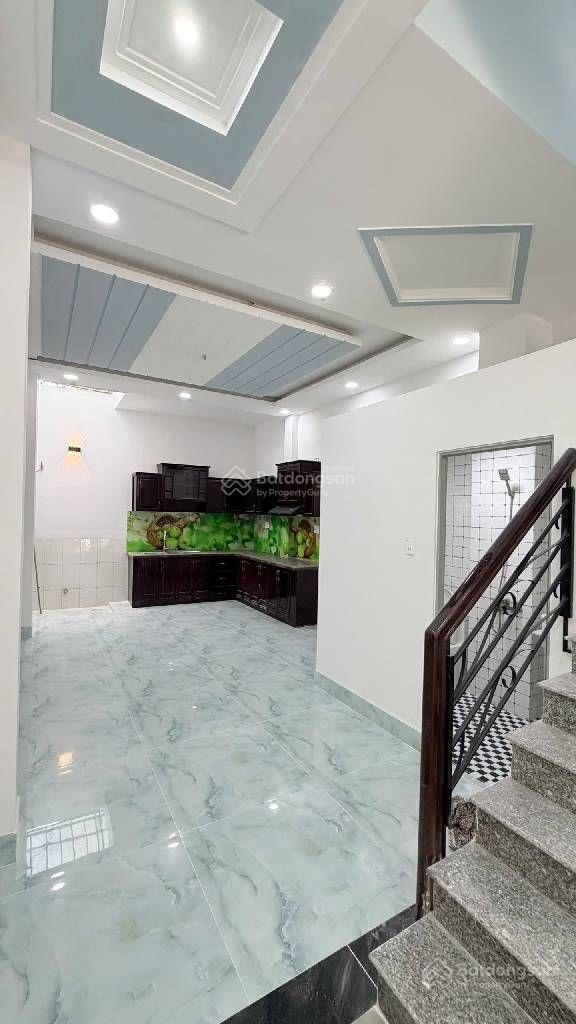 Nhà mtkd 1t2l,st đường 12m lề 3m khu dân cư lý chiêu hoàng khang điền