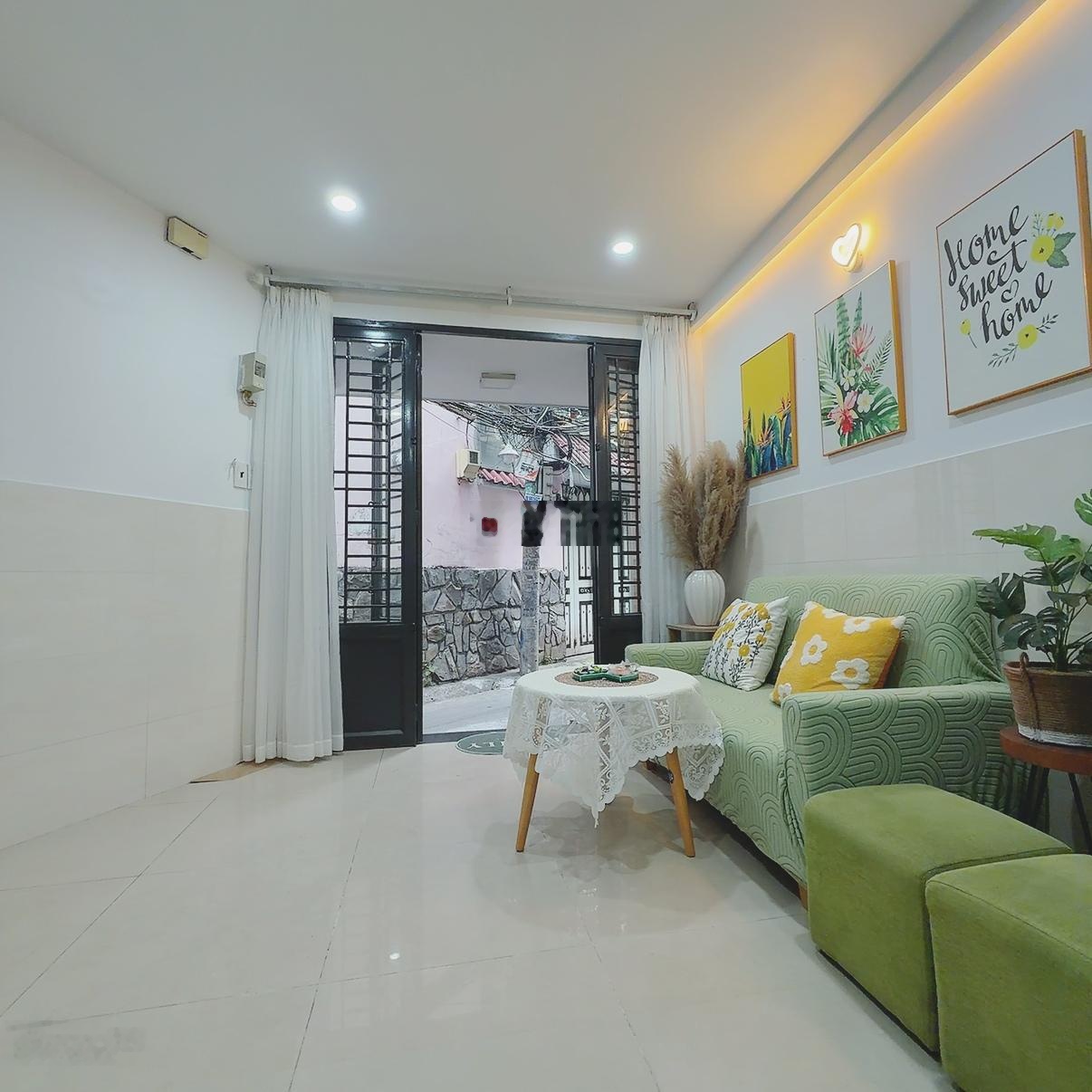 Nhà Quận 7 gần cầu Tân Thuận sổ hồng riêng hẻm thông, có sân 2,95 tỷ