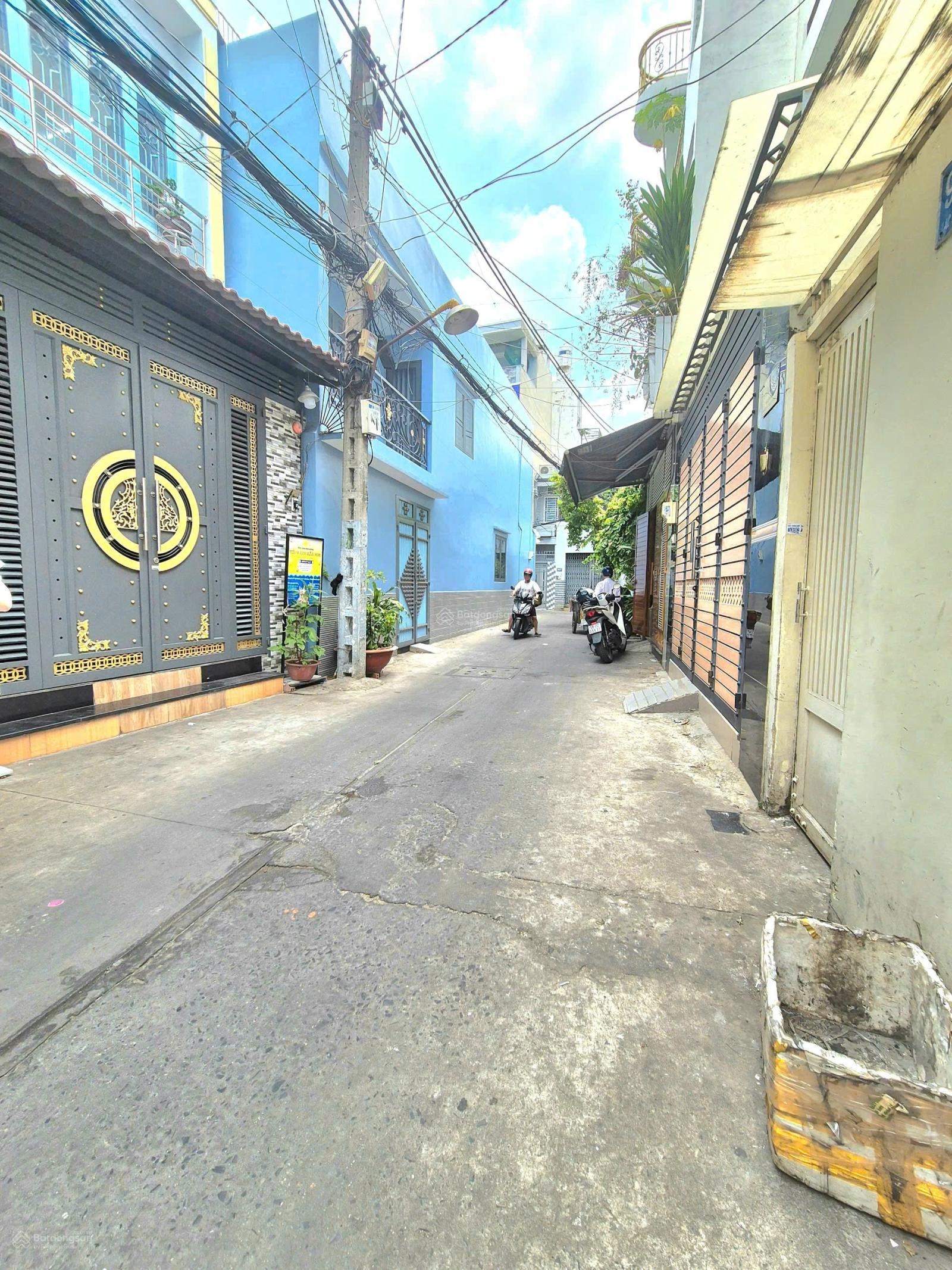 Nhà hẽm xe hơi Nhà 2 lầu . Có thể làm 7PN. Cho thuê thu nhập 30tr/tháng, DT 4.85x 13m,0909505219