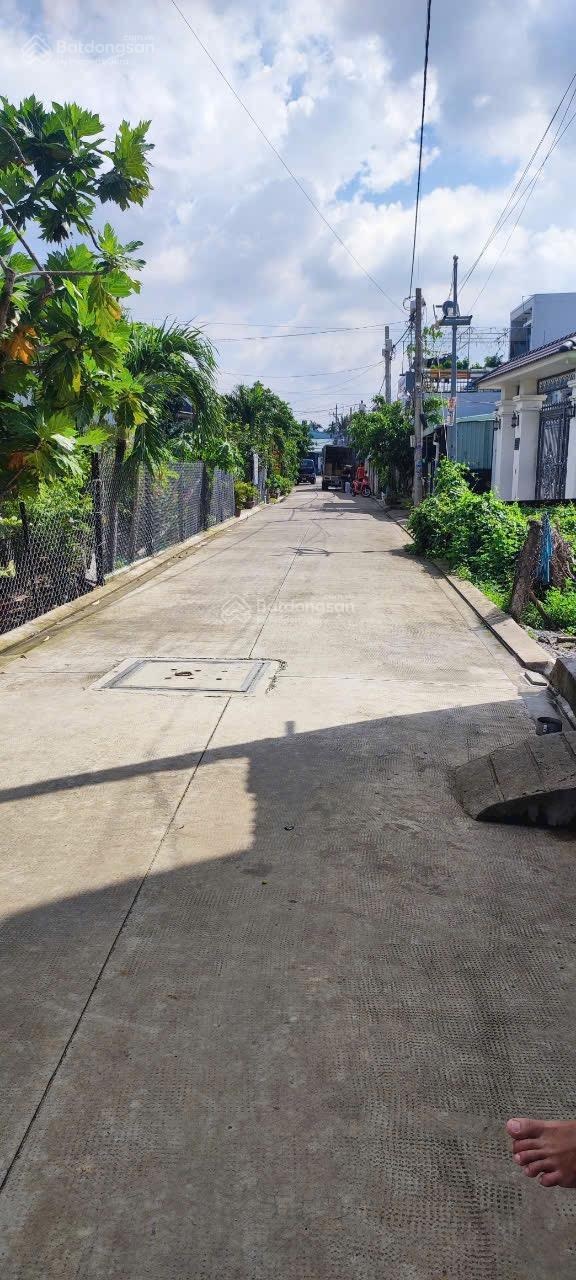 Bán đất 1 sẹc An Phú Đông 25, diện tích: 10x55m =732m2 thổ 711m2 đường bê tông 6m sổ riêng