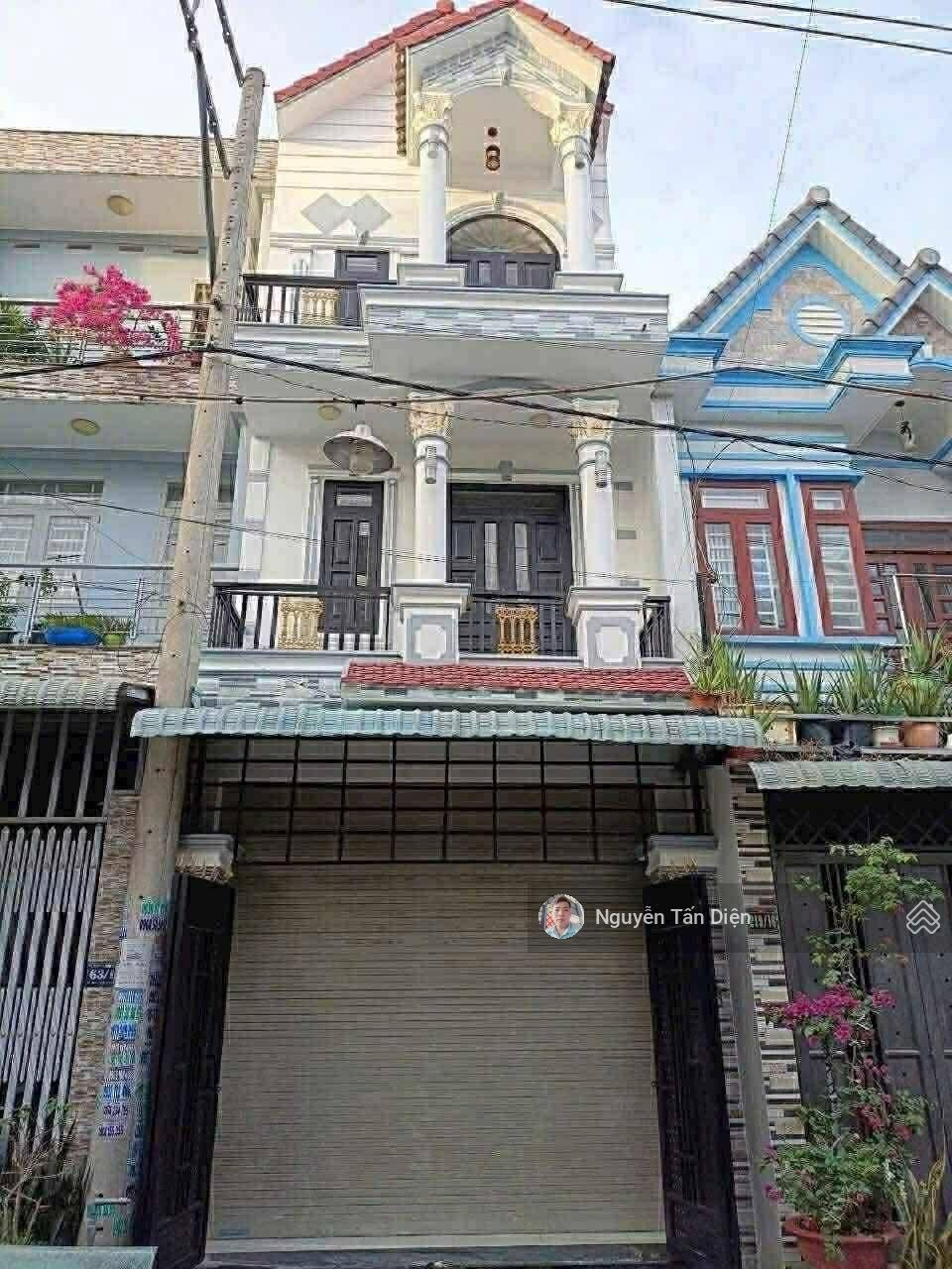 Nhà trệt 2 lầu hướng Nam ngay chợ Phú Phong chỉ 3 tỷ 7