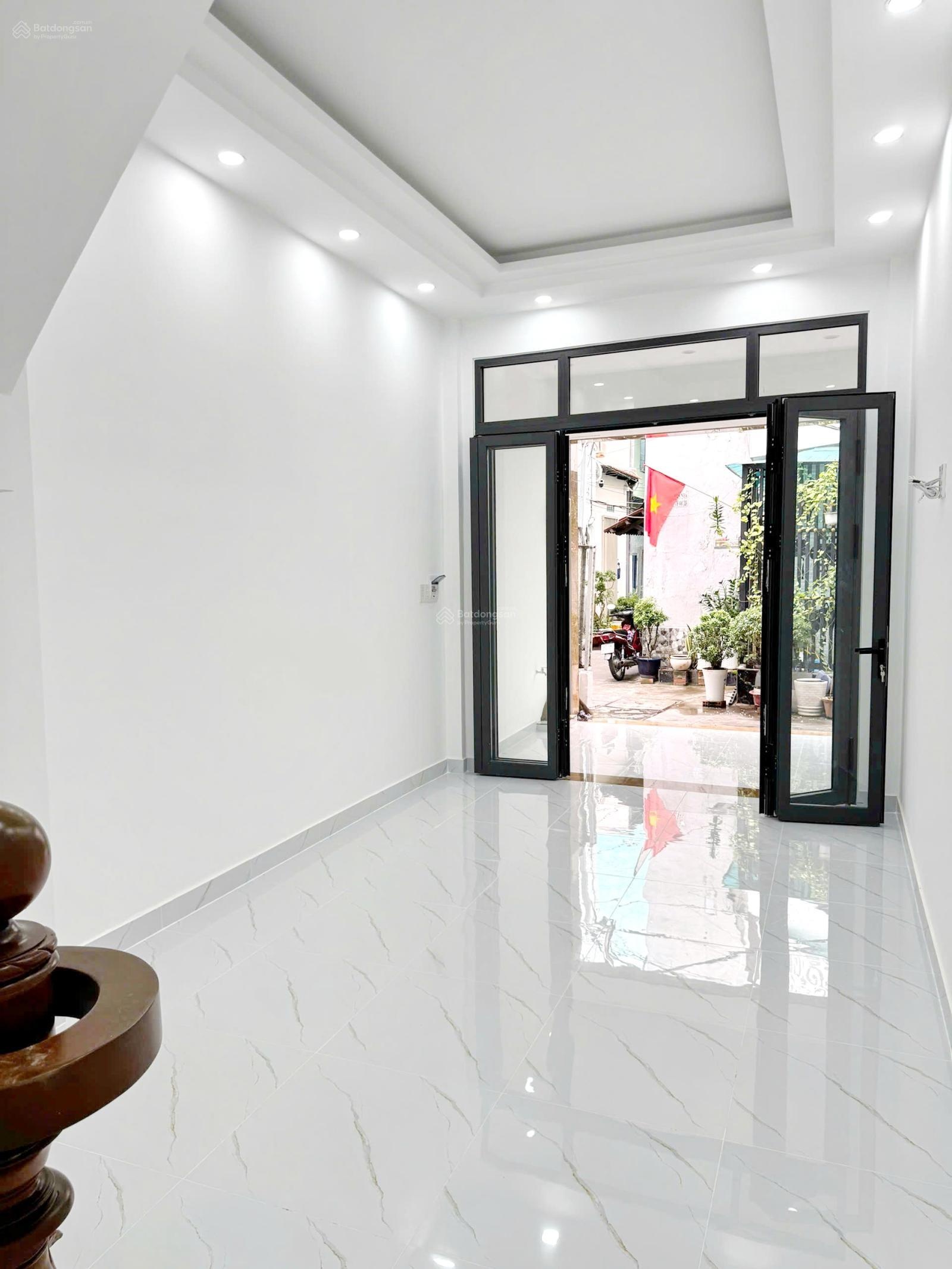 Nhà mới 2 lầu 4pn sát mt hẻm xe tải đường âu dương lân quận 8