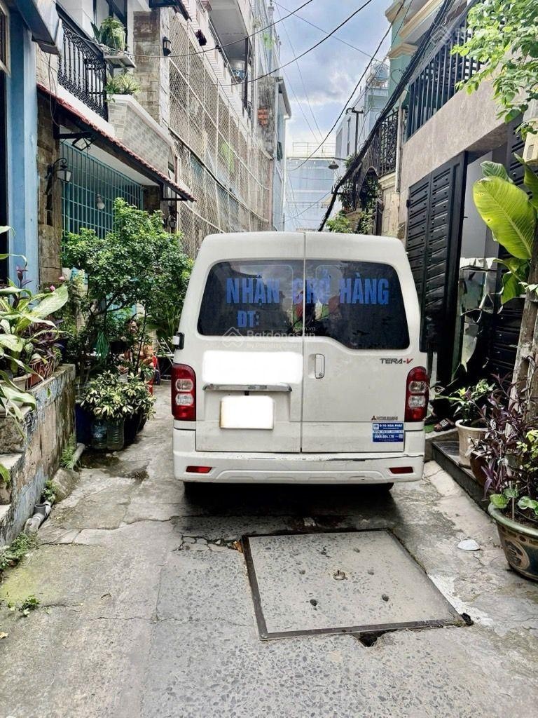 Nhà 4 tầng btct, 60m2,ngay gần bến xe miền đông,qlộ 13.b.thạnh,xe hơi ngủ trong nhà,sổ a4,shr,4pn