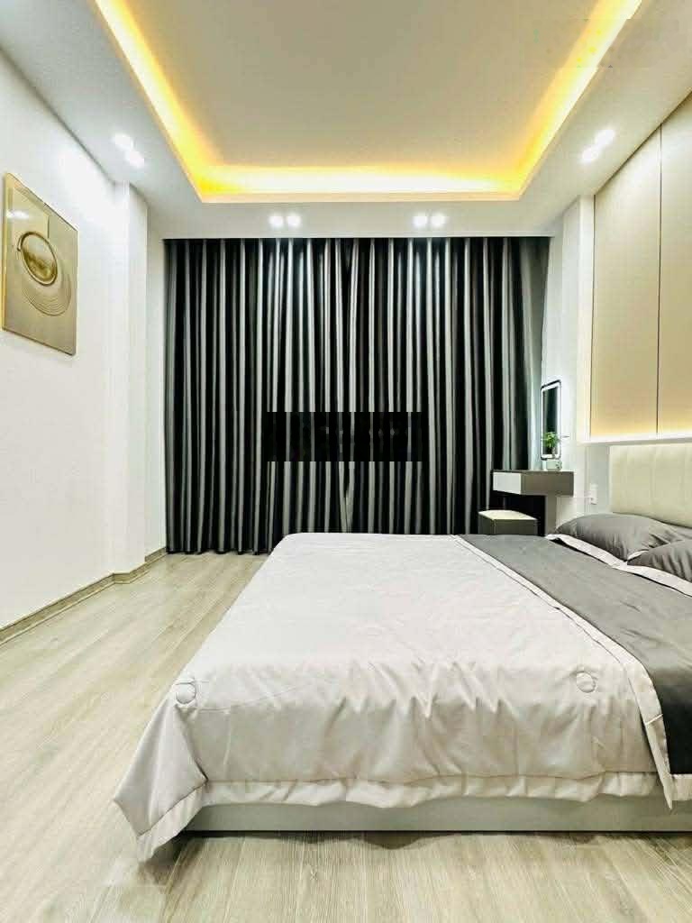 Bán nhà Xuân La, 9,3 tỷ, 42 m2 x 5 tầng thang máy , OTO vòng quanh, gần ngoại giao đoàn