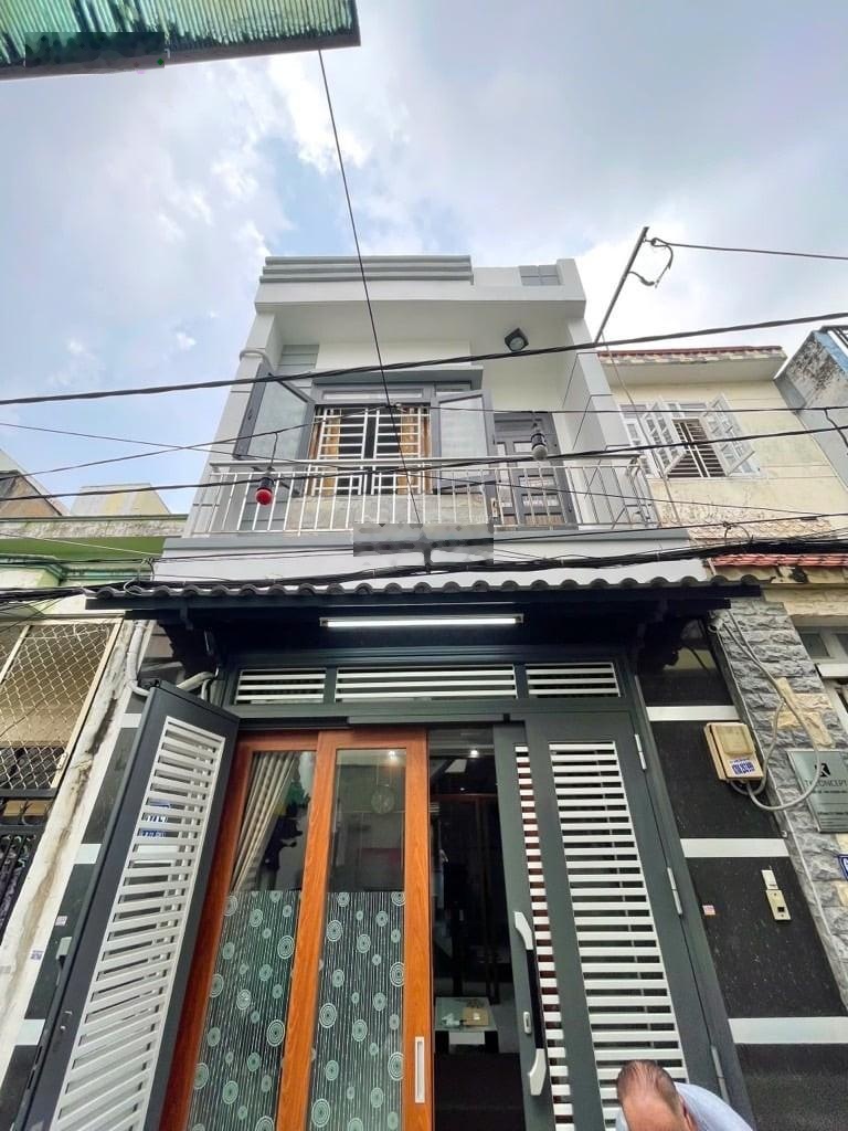 Nhà quang trung - trệt lầu - xe hơi thông - nhà mới ở ngay - nhỉnh 6 tỷ