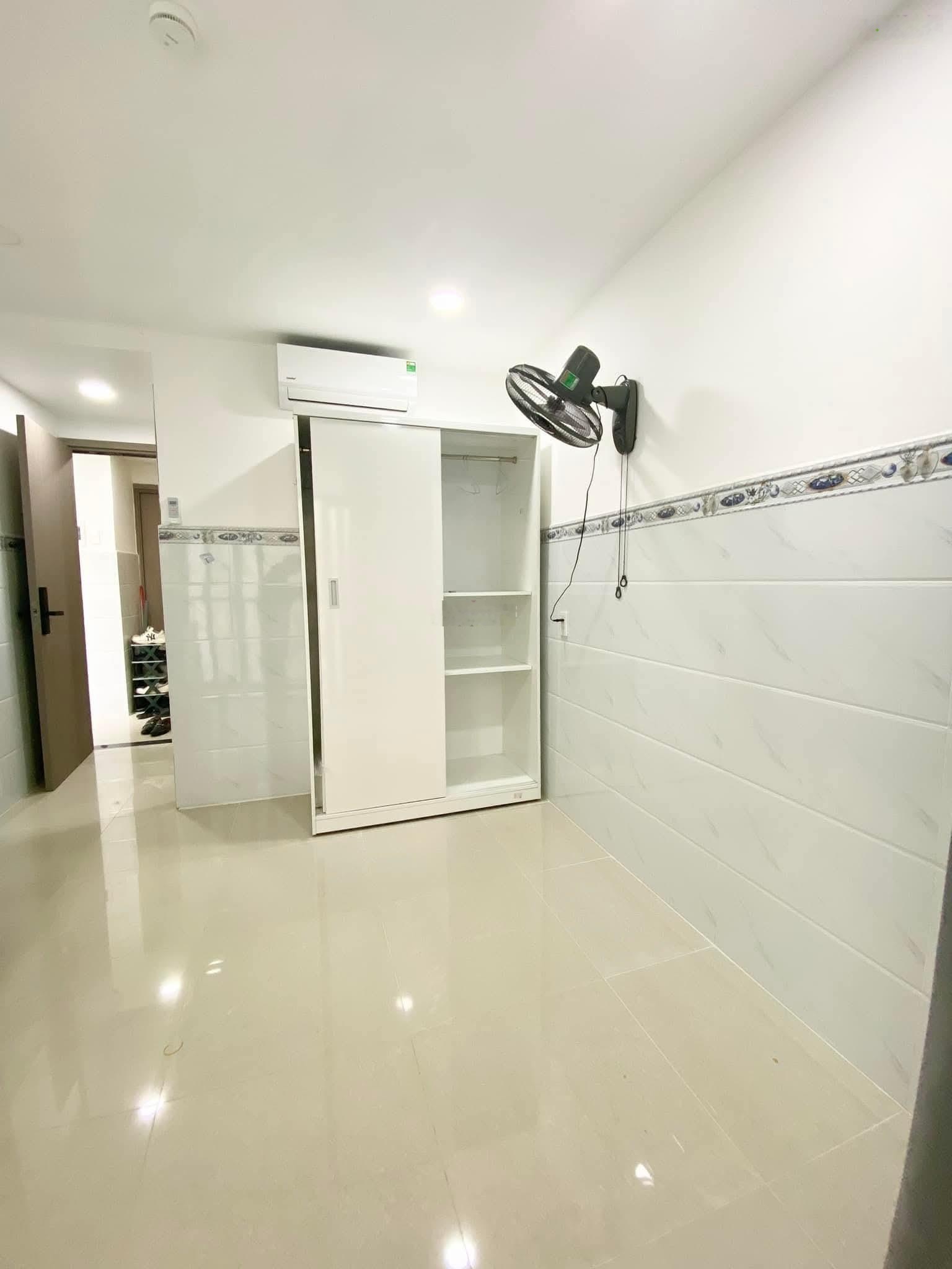 Toà nhà mới ngay Lê Quang Định, Bình Thạnh. Có thang máy, hầm xe_ 4x12m (48m2)_ BTCT 5 tầng