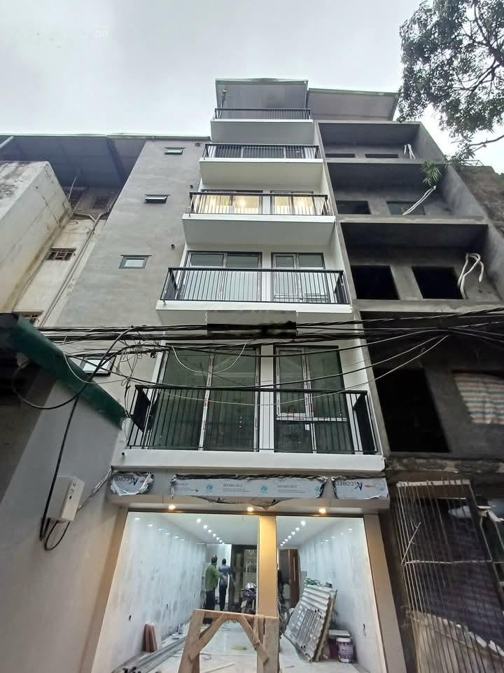 Tòa nhà mặt phố Kim Đồng HM 45.9tỷ, 122m2 6 tầng nhà một mặt phố một mặt ngõ ô tô tránh KD VIP