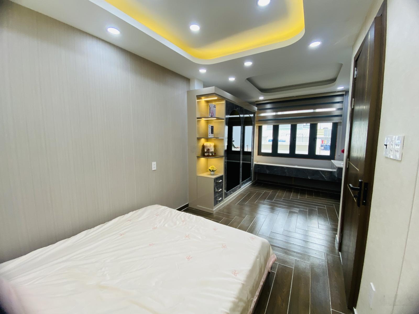 Nhà 4 tầng xây mới ngang 5m, HXH đậu trong nhà Quang Trung, P. Thông Tây Hội (P8 cũ), GV