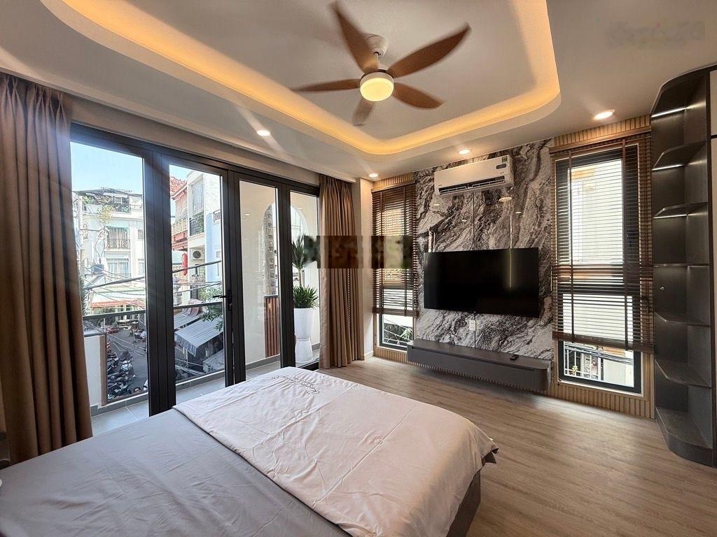 Bán nhà hẻm xe hơi Điện Biên Phủ sát Quận 1 5 tầng mới giá 7.x tỷ