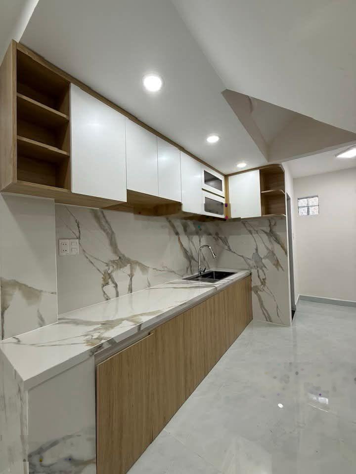 Nhà mới quận 4 khu dân cư hiện hữu đừơng tôn đản nhà 5 tấm dt 39,7m2(n3d14) trệt 1 lửng 3 lầu