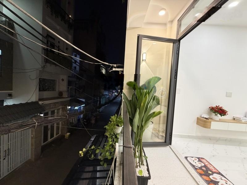 Bán nhà phú nhuận oto vào nhà 60m2 2 tầng nở hậu 5m đẹp kd đỉnh thích quảng đức 9.8 tỷ