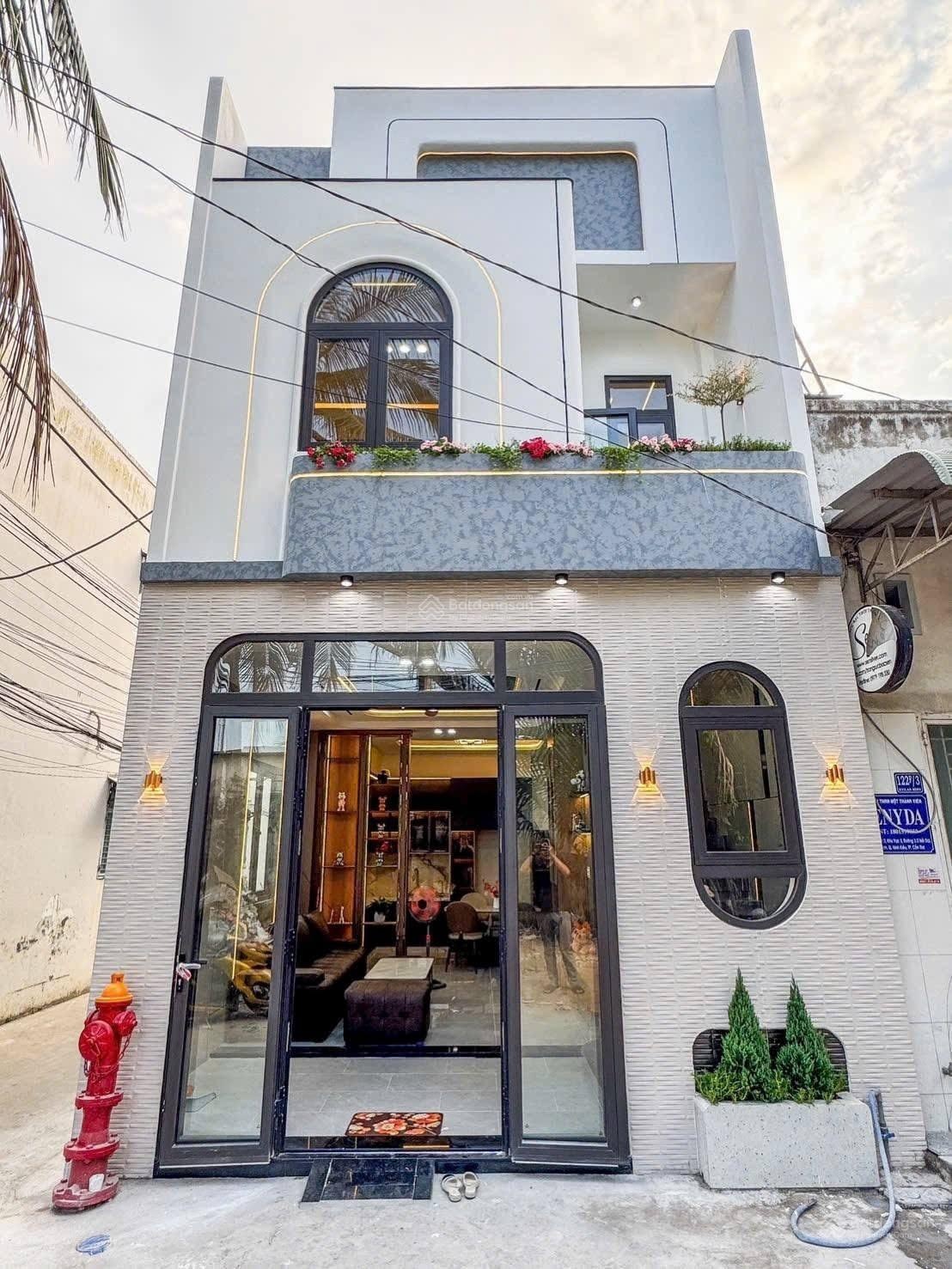 Bán nhà trệt lầu mới 100% góc 2 mặt nhà gần chợ an bình , khu du lịch chợ nổi cái răng