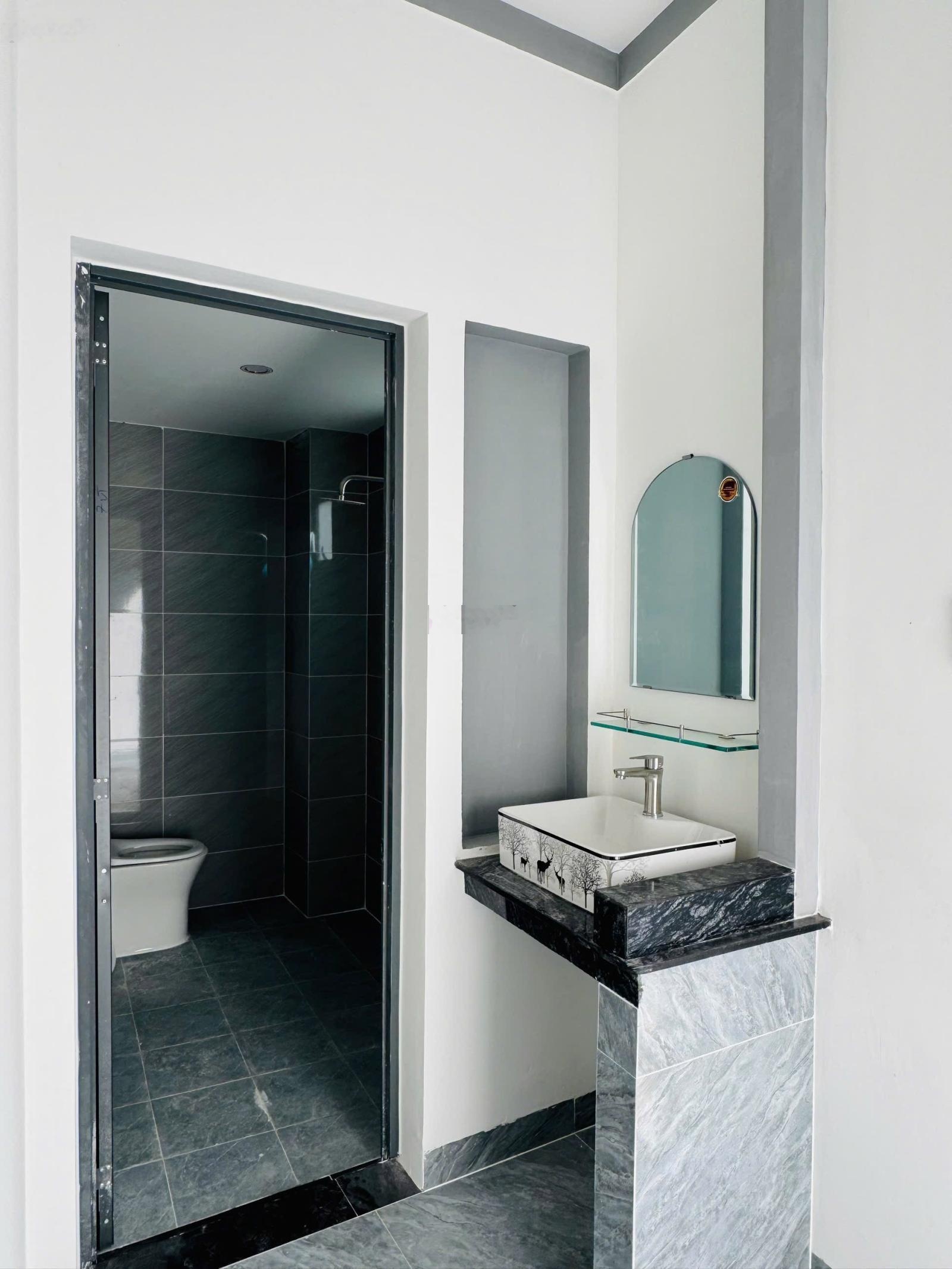 Bán nhà mới xây 1/DH 616 Tân Định Bến Cát ( cũ) 105m2 full thổ cư