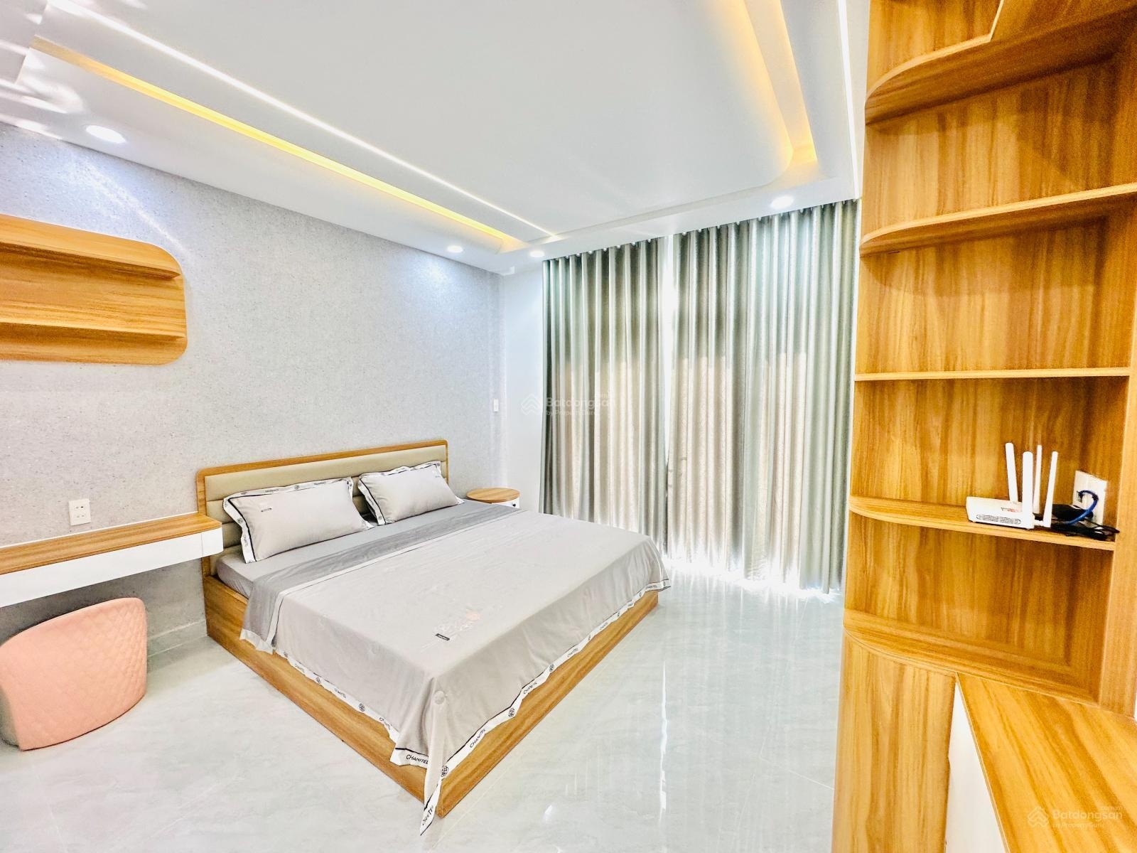 Nhà phố 4m x 20m 1 lửng 4 lầu có thang máy 650kg hẻm nhựa 10m đường Tân Chánh Hiệp 18