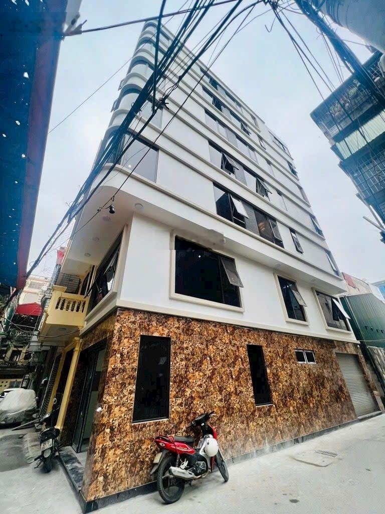 Nguyễn trãi - tòa nhà văn phòng - lô góc 3 mặt ngõ - 7 tầng - thang máy - ô tô đỗ cửa