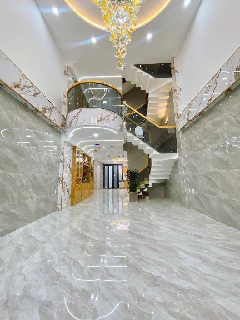 5 Tầng BTCT.Tân Phú-Văn Cao.Ngang gần 5m Dài 17m.HXH 6m thông.Sổ vuông A4.CN đủ,thang máy xịn 450kg