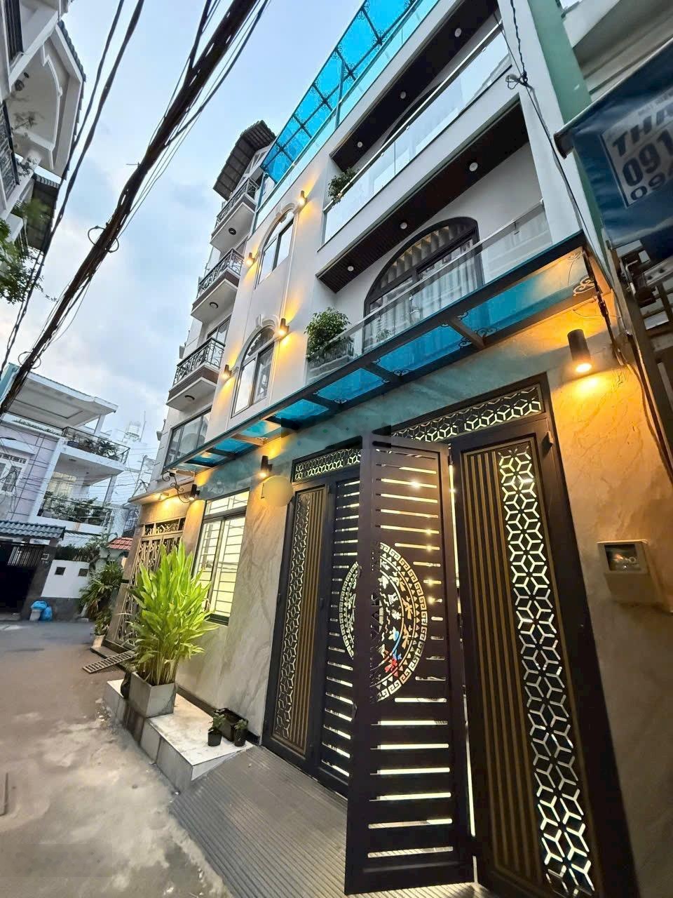 siêu hiếm- sát đg Phạm Văn Đồng- Bình Thạnh- 4 tầng lầu, ô tô ngủ trong nhà - 4 phòng ngủ