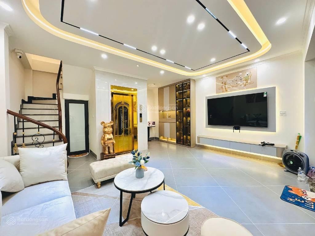 Tây sơn - 40m x 7 tầng thang máy - nội thất vip - ngõ thông, cách ô tô 30m - nở hậu - nhỉnh 12 tỷ