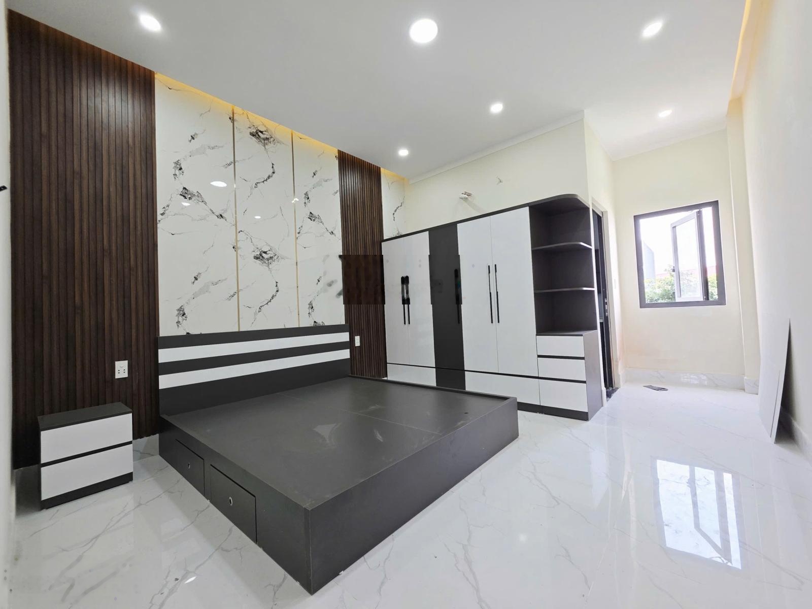 Bán nhà mới xây gần vòng xoay An Phú, cách DT743 100m, SHR, nhà 4PN 4WC và sân thượng