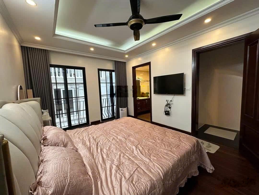 Cần bán nhà 2 mặt ngõ,dòng tiền khủng mặt ngõ, Ôtô, phố Vạn Bảo, DT 65m x 7 tầng, MT 5,2M Gía 21 tỷ