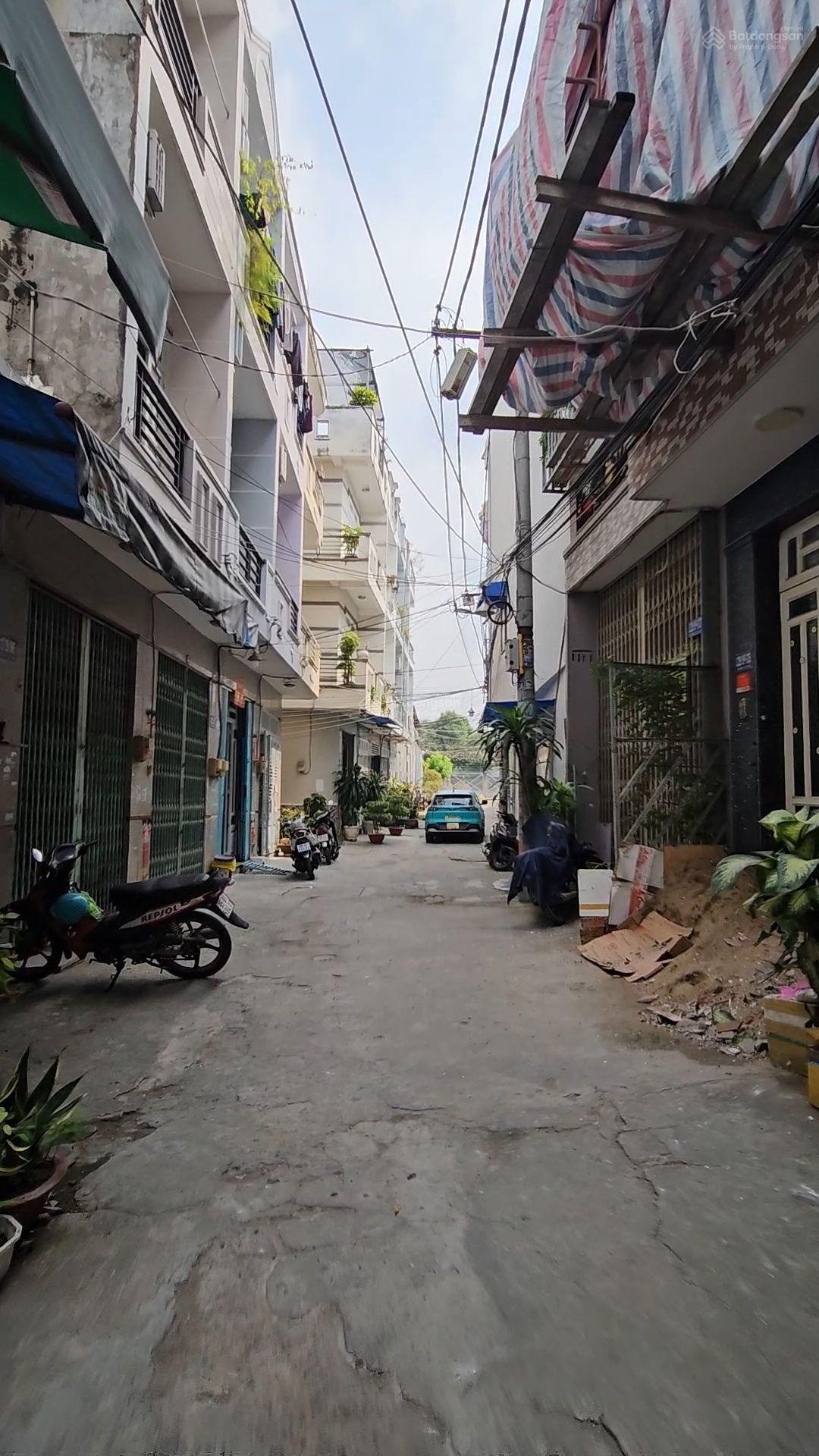 Nhà mới 4 tầng hẻm ô tô đậu cửa khu cao tầng đồng bộ hẻm thông