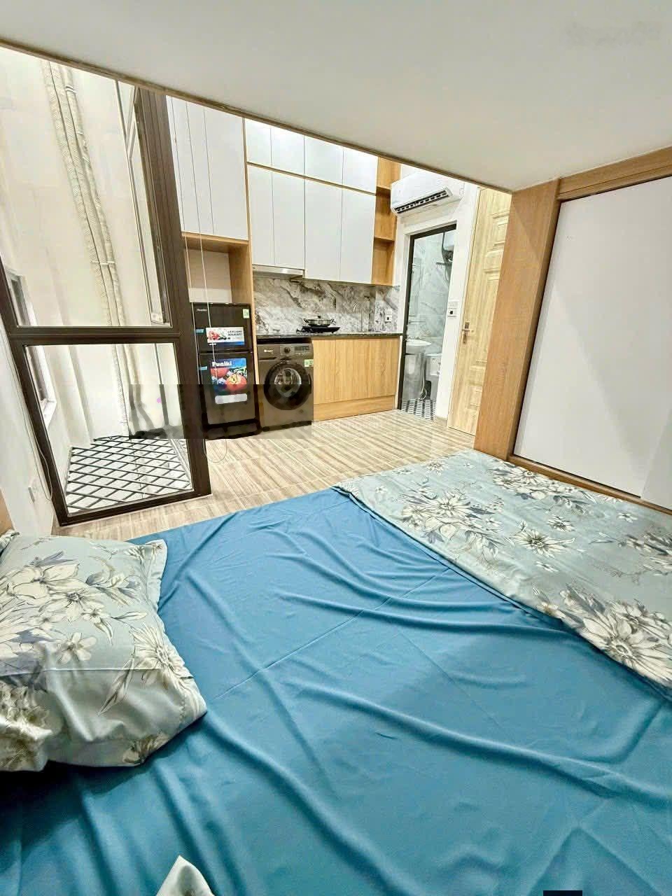 Giảm 500tr. Toà nhà dòng tiền Láng Hạ. 18 phòng KK, mặt tiền rộng, ngõ thông, 25m ra ô tô tránh đỗ