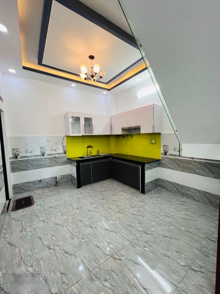 Bán nhà mới đẹp 1 trệt 1 lầu 48m2 sổ riêng hẻm 38 Lâm Văn Bền 3 mặt tiền