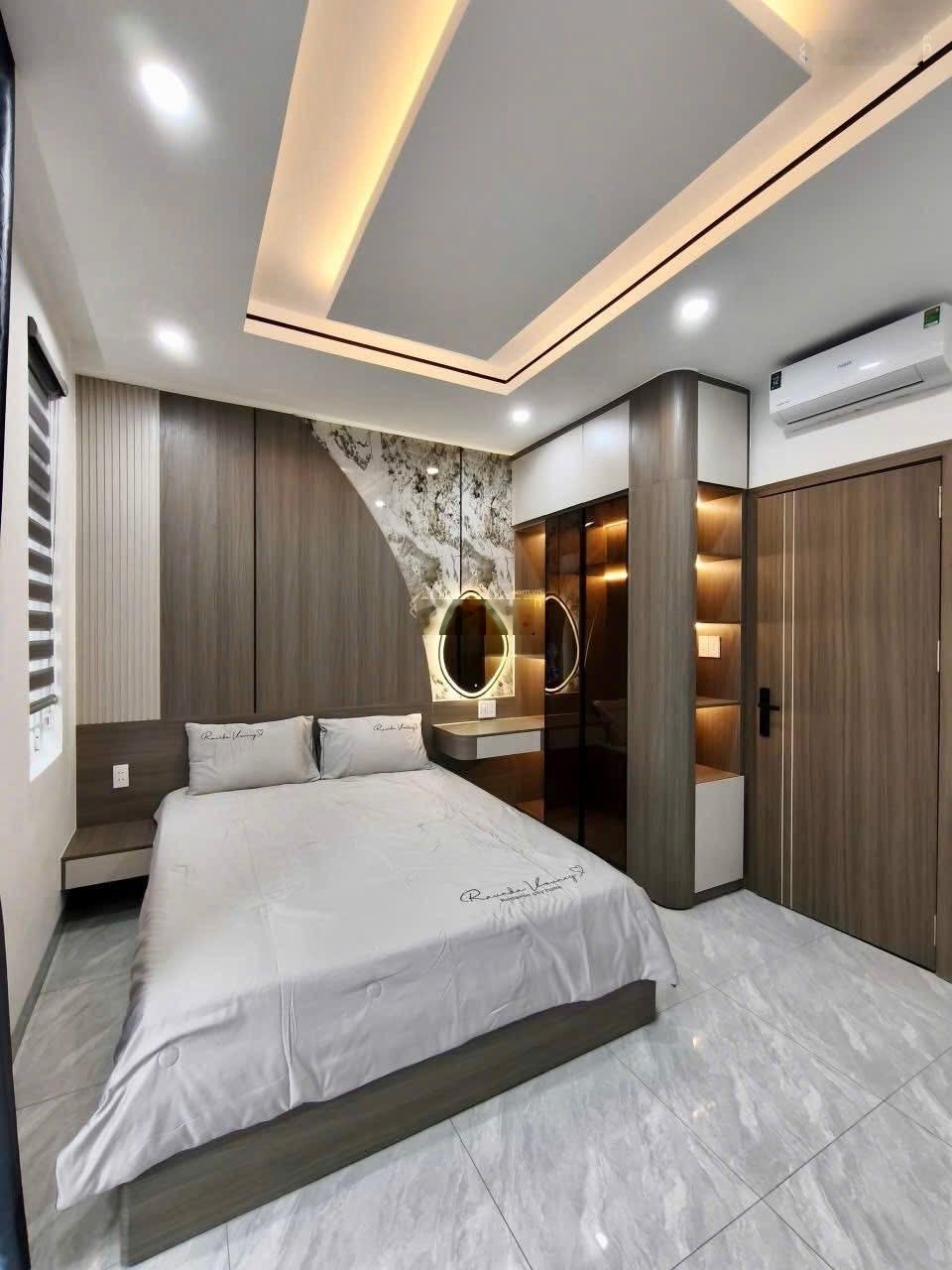 Nhà 3 lầu cao cấp sân xe hơi hẻm 12m gần Cầu An Lộc - Giáp Gò Vấp. DT. 4.1m x 19.8m - 80m2. Giá tốt