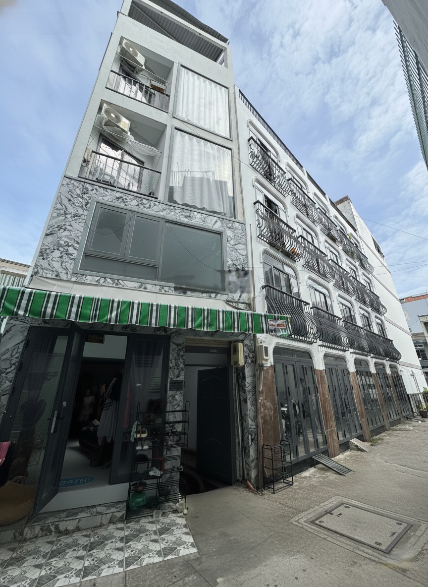 Toà nhà mới ngay Lê Quang Định, Bình Thạnh. Có thang máy, hầm xe_ 4x12m (48m2)_ BTCT 5 tầng