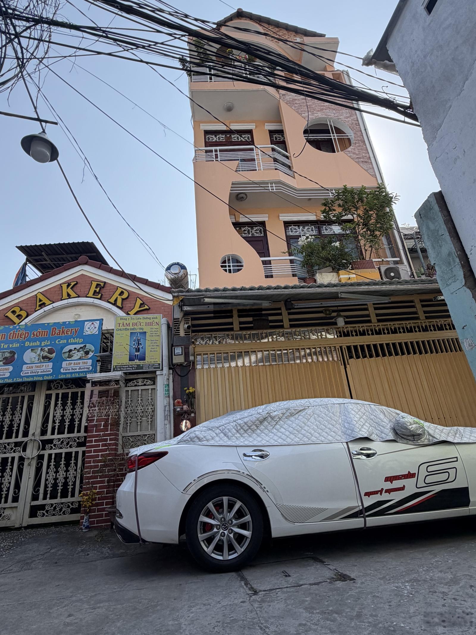 NHÀ 4TẦNG BTCT -DT 110m2 -HXH -NHỈNH 12Đ (TL )Ngay nhà thi đấu đa năng quận7