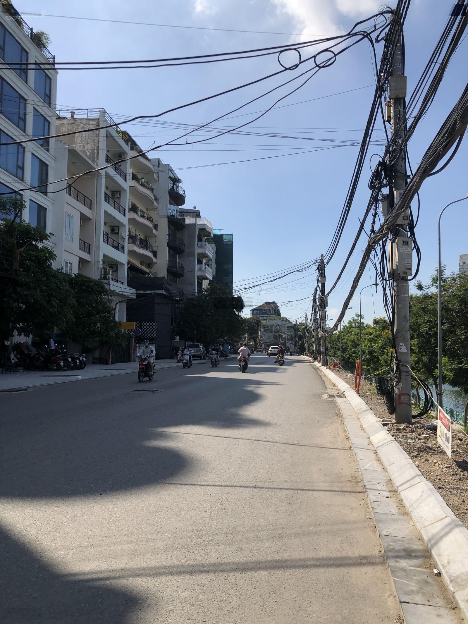 Bán nhà MP Xuân Diệu - Tây Hồ, DT 90m2 x 5T x MT 5.5m x giá 60 tỷ. View hồ, doanh thu 60tr/1 th