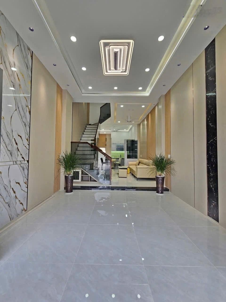 Nhà 1 trệt 2 lầu mặt tiền kdc tân đông hiệp- dĩ an - bình dương- tp. hcm diện tích: 4,5m x 15m