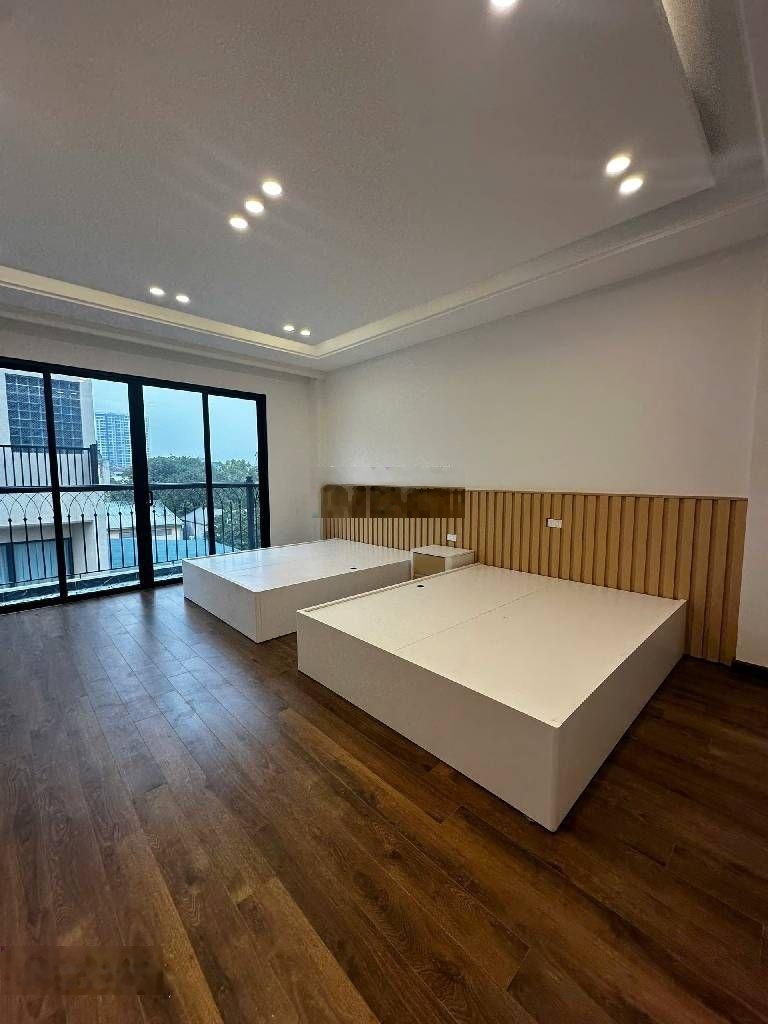 Phố lâm hạ long biên 7 tầng thang máy gara oto 7 chỗ 2x tỏi.