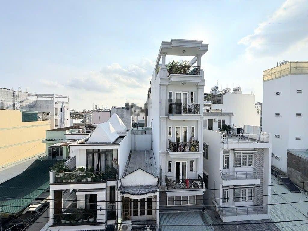 Bán tòa nhà Kd khách sạn hẻm xe trải tránh 6 tầng 17 phòng full nội thất