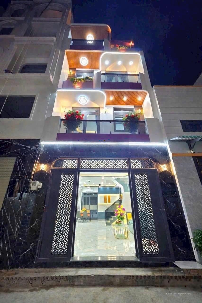 Nhà mới 100% hẻm xe hơi sát quận 7