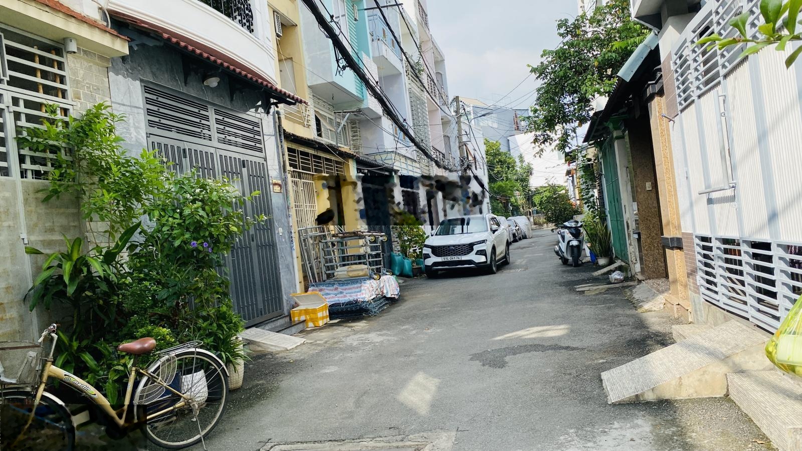 Nhà 1 trệt 1 lầu 5x13m nở hậu 5.9m 63.5m2 ngay chợ An Nhơn. Tiện sửa bán, xây CHDV