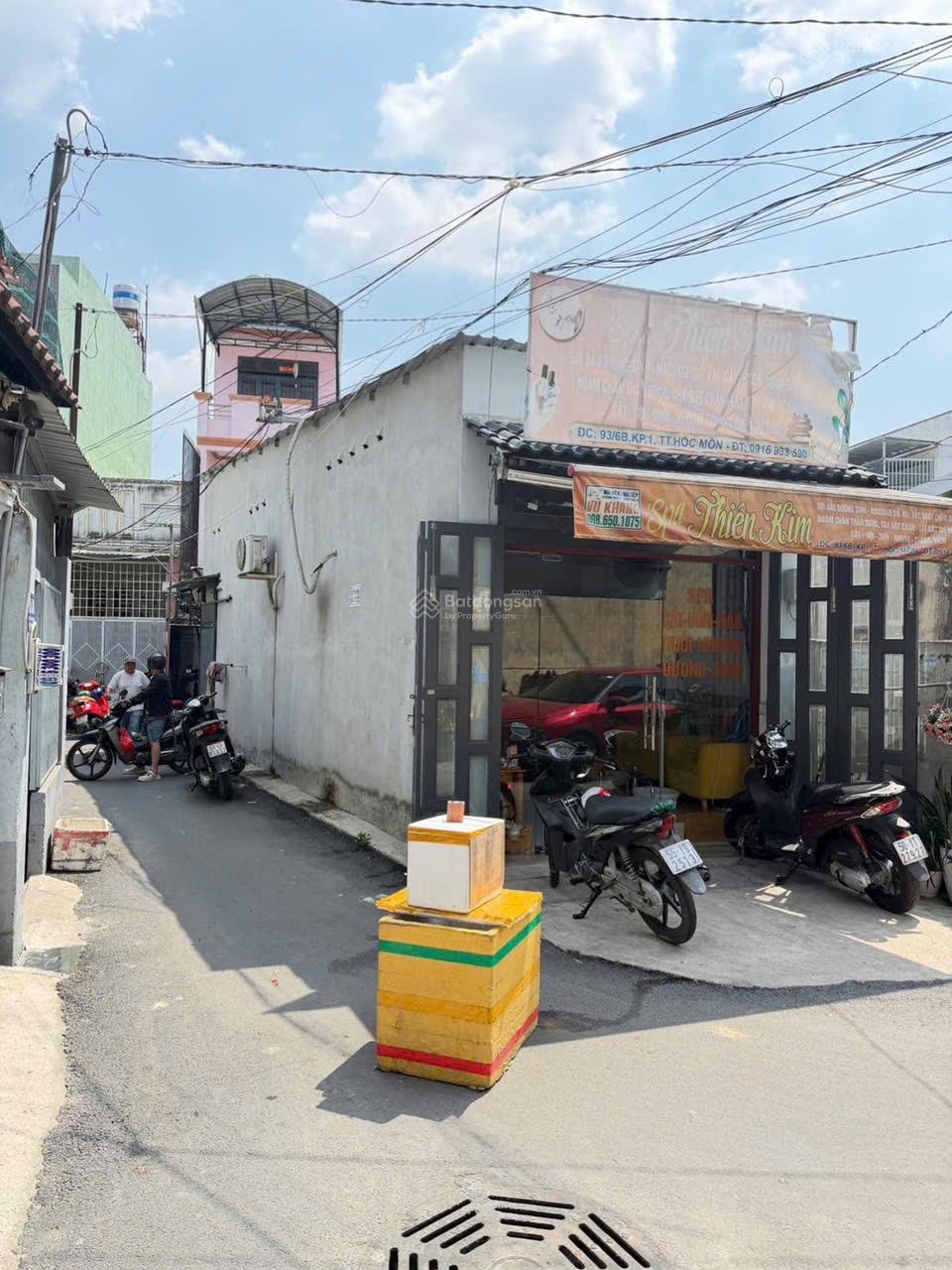 Nhà mặt tiền đường nhựa dt 56m, bà triêu hóc môn, sổ hồng riêng , giá 2ty680