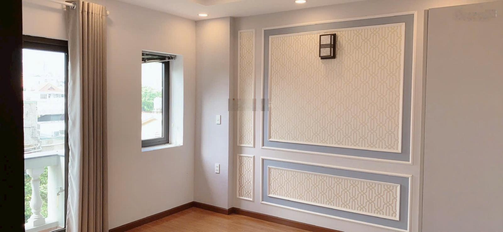 Nhà phố liền kề 1 trục HXH sát MT trệt lửng 3 lầu (5PN) vị trí đẹpPhạm Văn Chiêu P14
