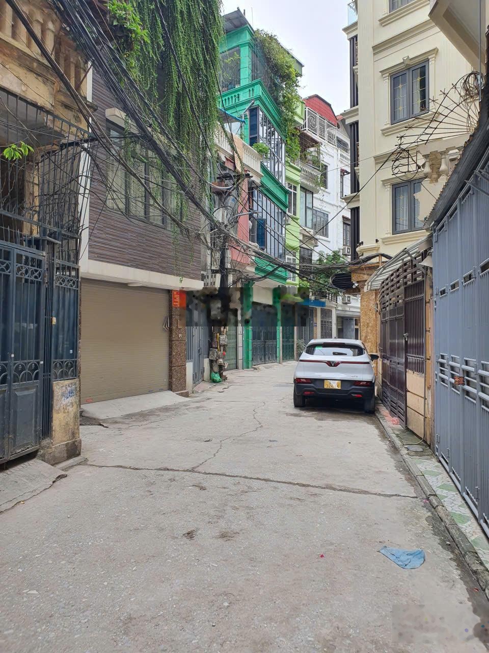 Lô góc - Mặt phân lô 2 ô tô tránh, gara T1 - nhà 42m2 - 5T, phố Hoàng Cầu, 15.5 tỷ