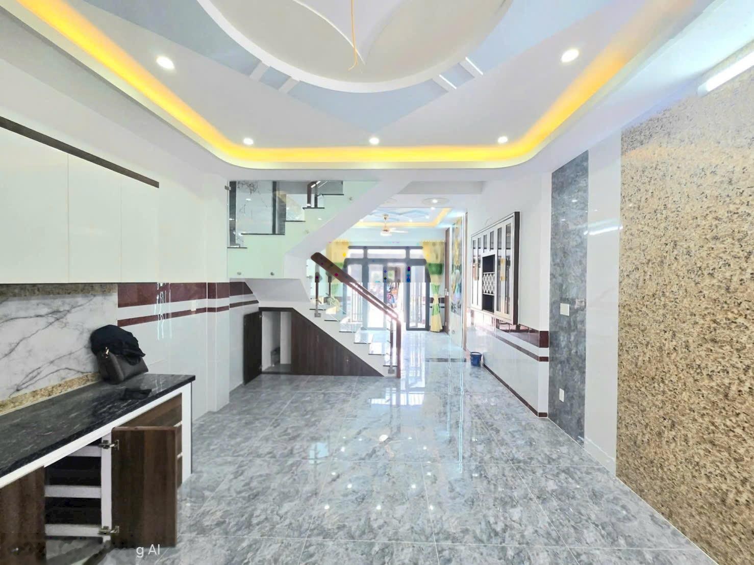 Nhà 4 tầng, hẻm xe hơi, ngay trường Đại học Tài Chính Marketing giá 6,6 tỷ/65m2