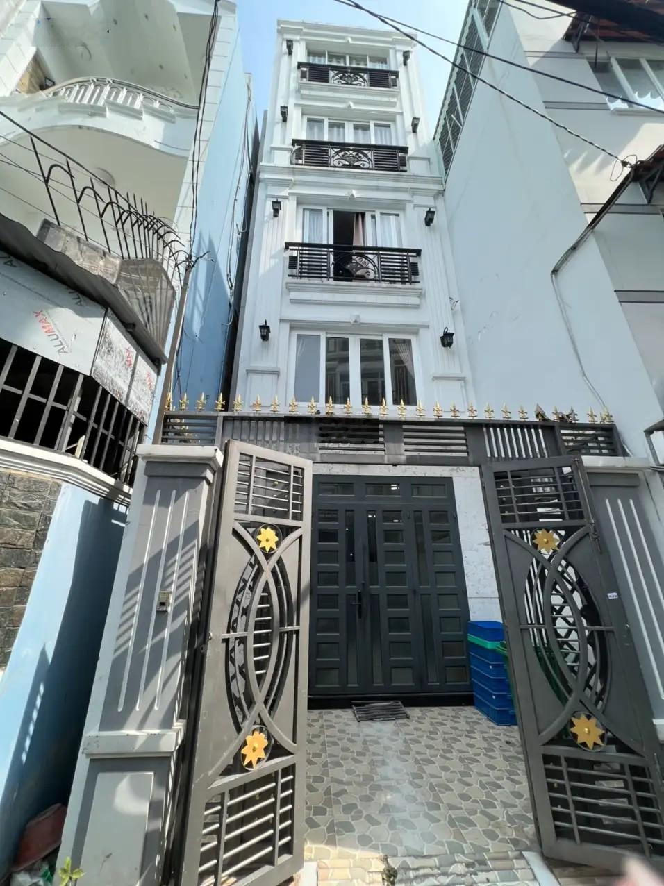 Bán nguyên căn lầu đúc 5tst [dtsd: 235m2] ngay phan đăng lưu, p. cầu kiệu pn, chỉ 12,9t tl