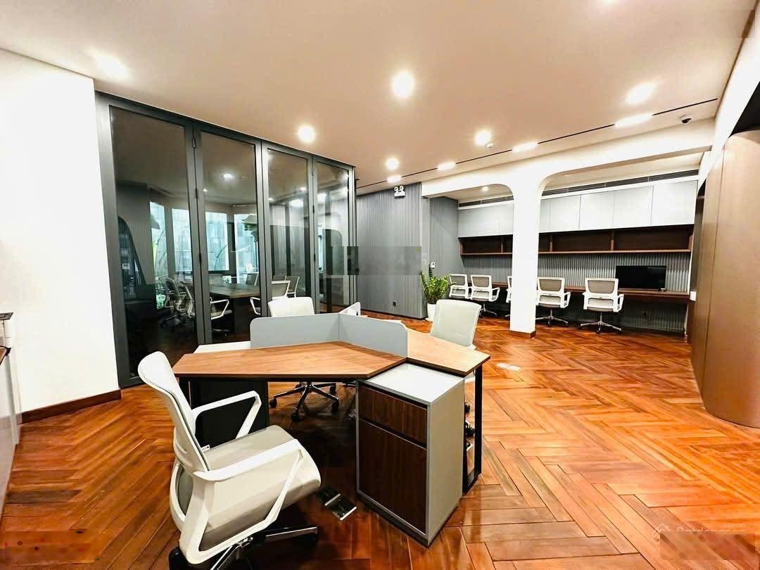Hàng hiếm! Mặt phố Vạn Bảo lô góc 2 mặt tiền oto tránh dừng đỗ vỉa hè 5m, 65m2*5T KD DT 1.5 tỷ/năm