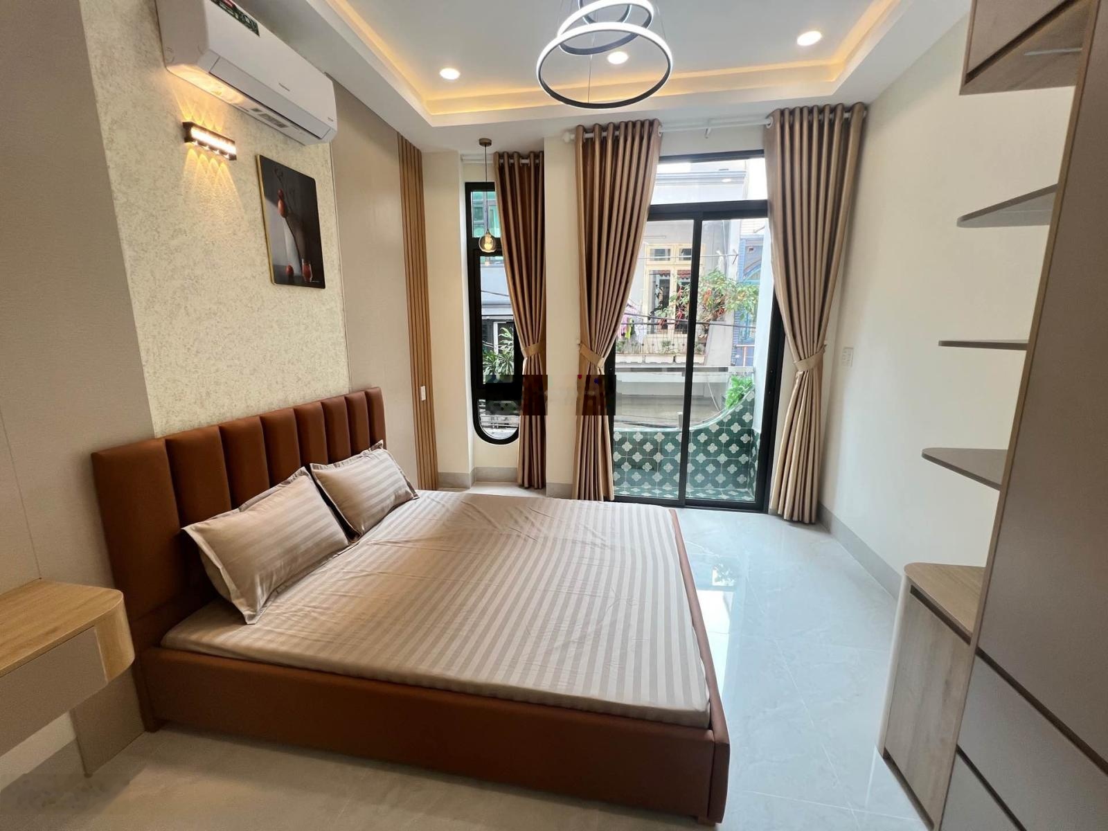 Nhà mới 4 tầng - hẻm xe hơi thông trường sa - chỉ hơn 8 tỷ