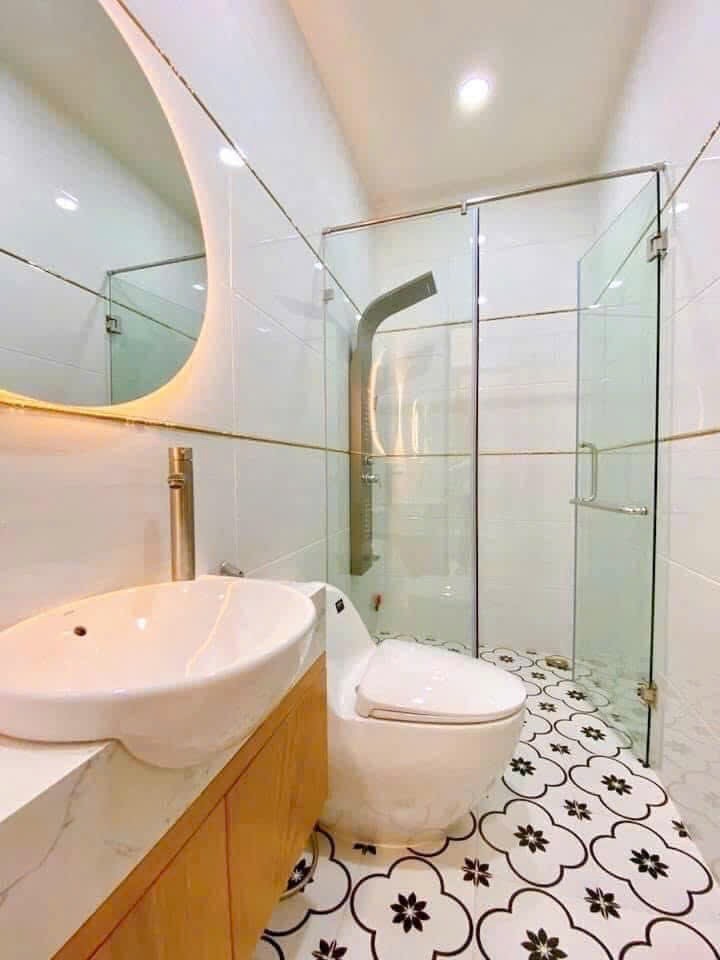 Bán nhà 4,5m x 14,47m, 5 tầng hẻm xe tải, thông ngay chợ An Nhơn