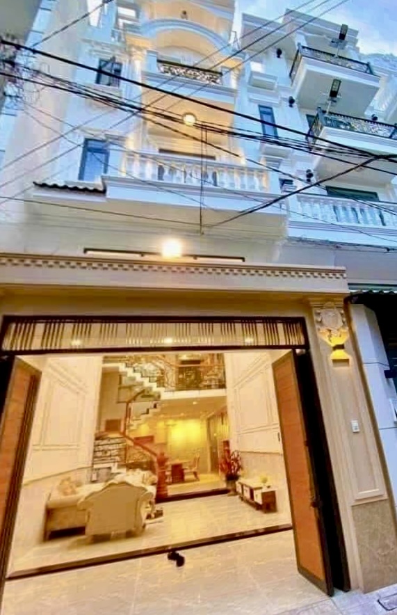 Bán nhà 4,5m x 14,47m, 5 tầng hẻm xe tải, thông ngay chợ An Nhơn