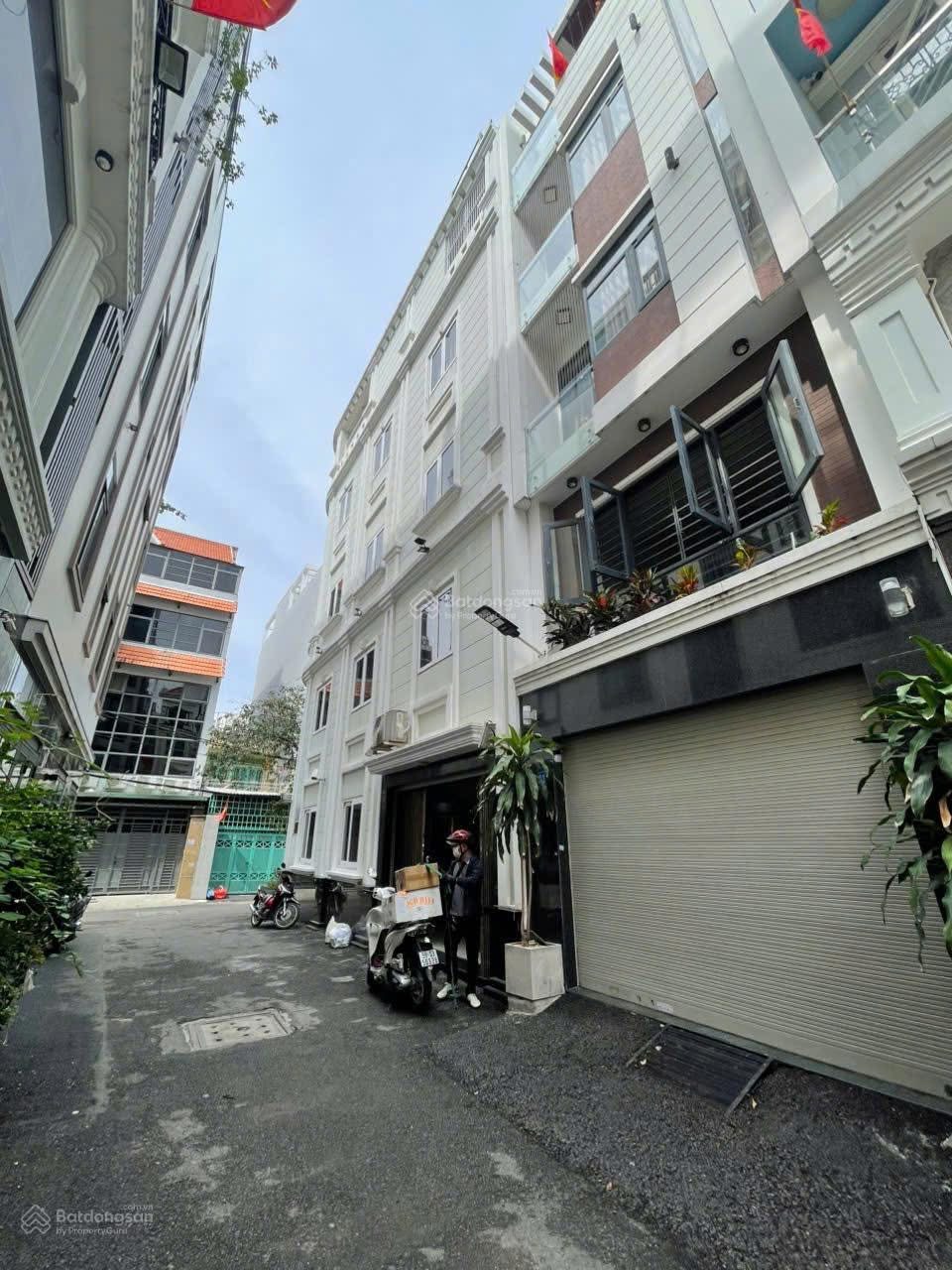 Hẻm nhựa 8m Nơ Trang Long - xe hơi ngủ nhà 50m2, 5 tầng bê tông cốt thép